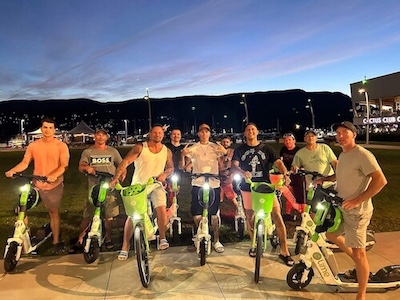 Inpatient Treatment 8 Men on bikes at dusk