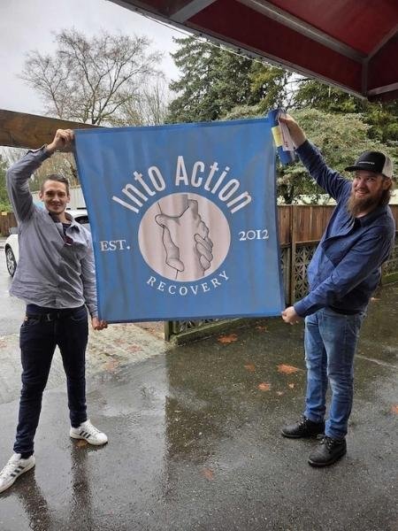 Alcohol Addiction Treatment Graduates Holding Into Action Canada Flag
