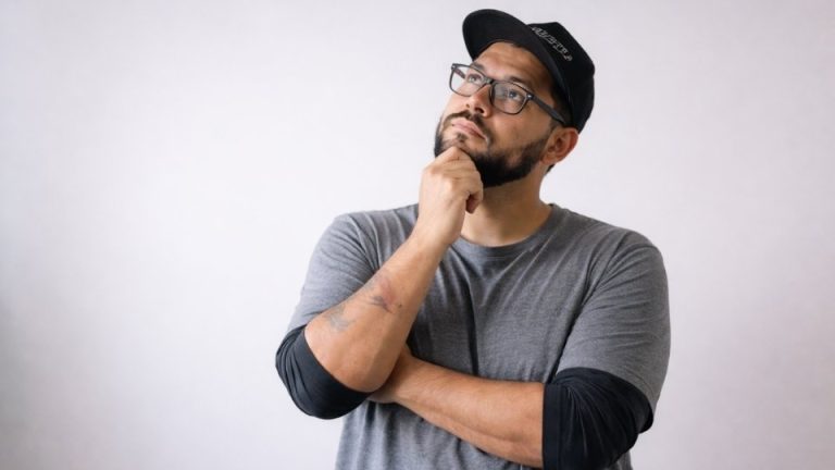 Is Alcohol a Stimulant or a Depressant A man in a hat ponders this question