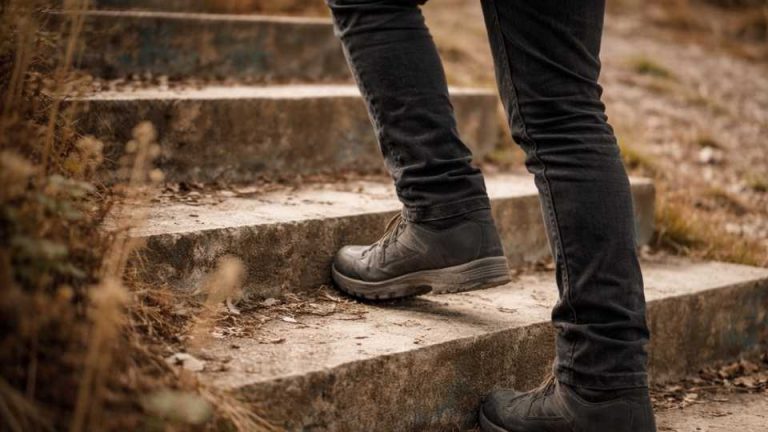 a man walking of the steps that symbolizing overcoming stages of addiction.
