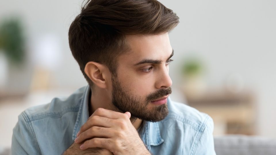 a man thinking about dry drunk syndrome and mood swings.