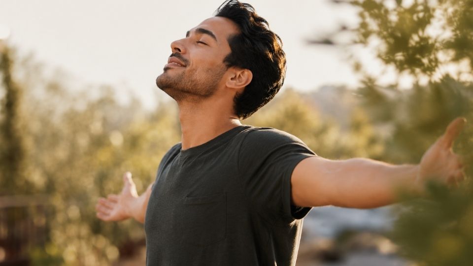 urge surfing hero image of a man embracing urges to overcome them during addiction.