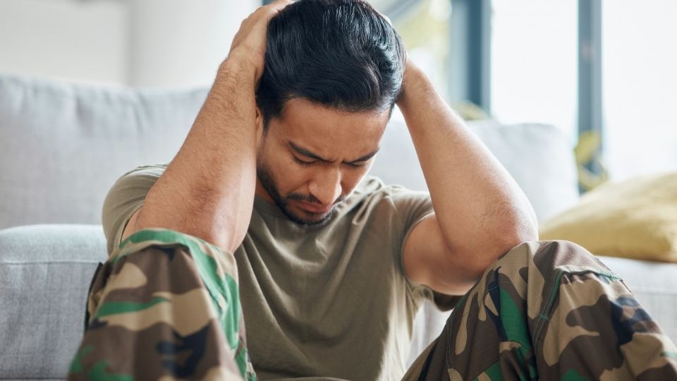 What Is Trauma Dumping hero image of a man in army fatigues.